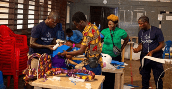 Participants working on their costumes.