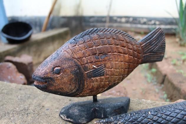 Wooden fish carved by Tonga people